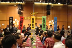 House heads with their house flags at the CAPT Formal Dinner