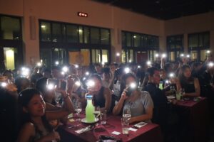 CAPTains with their flashlights supporting the performers